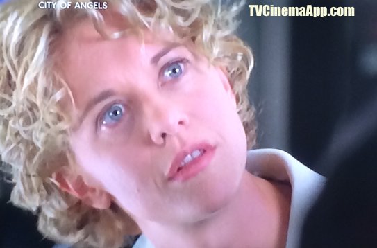 TV Cinema Gallery: Brad Silberling’s City of Angels, Meg Ryan, as surgeon Maggie Rice surprised when Nicolas Cage, angel Seth told her that he is not a human, but an angel.